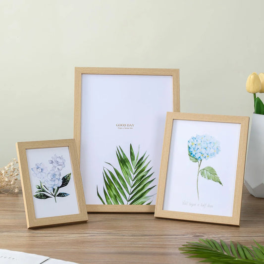 Wooden photo frame hanging on a wall with a family photo