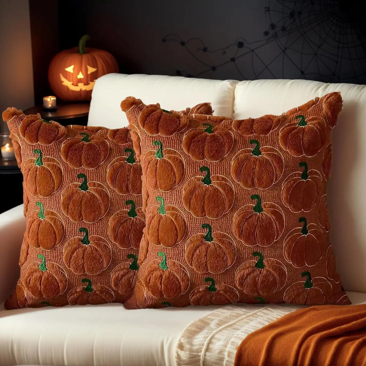 Faux fur cushion covers layered on a sofa for autumn and winter