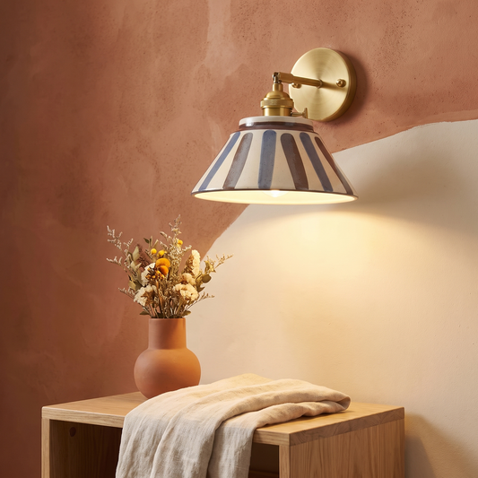 Ceramic wall lamp with Chinese tea house style design mounted above a side table