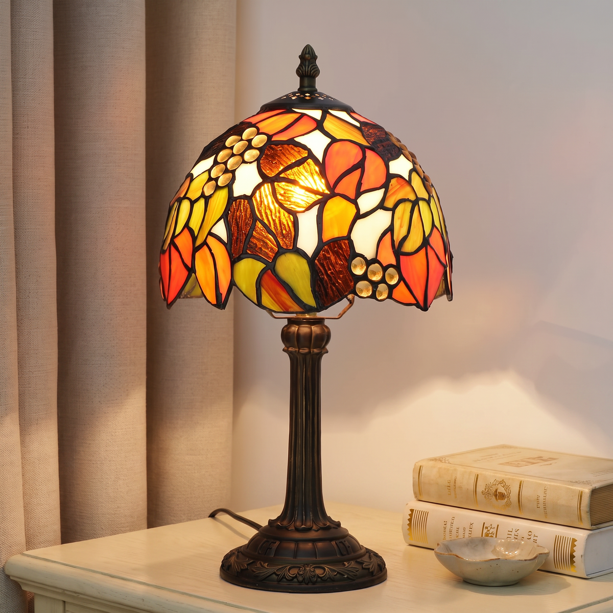 Vintage style table lamp with a turned base and fabric shade on a living room side table